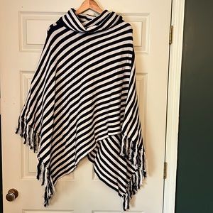 Pull over sweater. Striped. New. Never worn. Thick material. Poncho. Fringe.